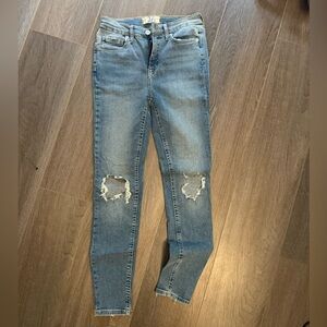 Ripped Knee Skinny Jeans